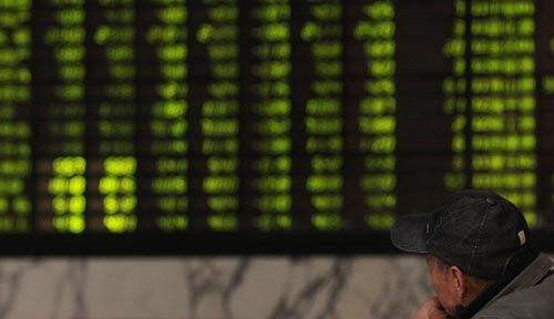 1st LD-Writethru: Chinese shares close lower Wednesday