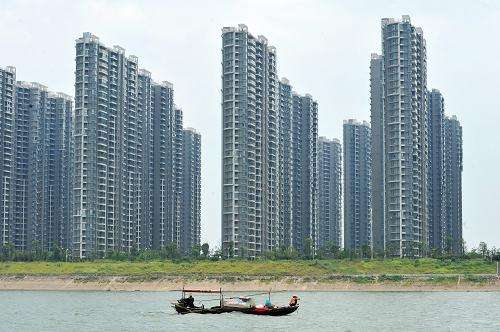 China's property investment grows faster in January-July