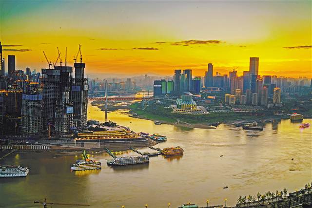 Economic Watch: China's investment, industrial output growth quickens, consumption growth slows