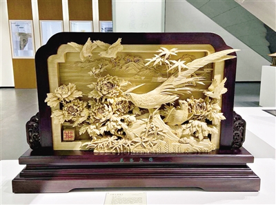 以融合創(chuàng)新打造“世界木雕·東陽紅木”新名片